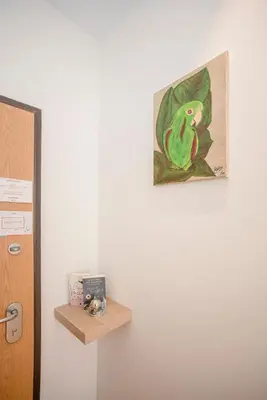 a painting of a frog on a wall next to a door at Liiiving in Porto-Mouzinho Residence Apartments in Porto
