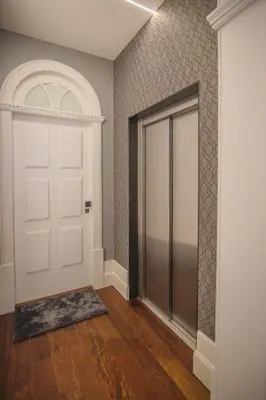 an empty hallway with a door and a rug at Porto Almada 180 Apartments in Porto