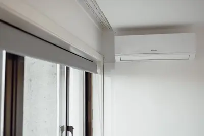 a ceiling fan in a room with a window at Downtown Stylish Apartment With Garage by Vacationy in Porto