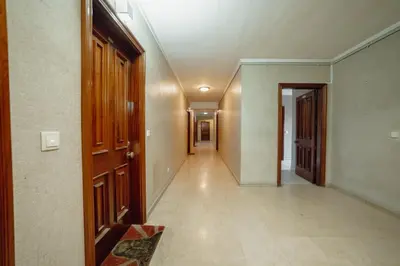 an empty hallway in a house with a hallway at Downtown Stylish Apartment With Garage by Vacationy in Porto