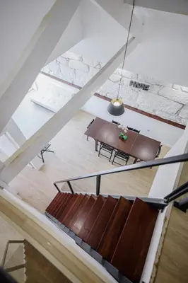 a staircase in a house with a black lamp at HEART OF THE CITY 1 ! in Vila Nova de Gaia
