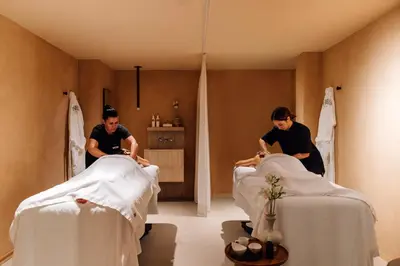 two men in a hospital room with beds at The Rebello Hotel & Spa - Small Luxury Hotels Of The World in Vila Nova de Gaia
