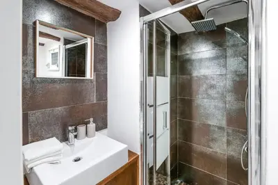 a bathroom with a sink and a shower at InLapa Studio V Porto Terrace in Porto