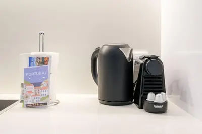 a coffee maker sitting on top of a counter at GuestReady - Port Studio 3 in Vila Nova de Gaia