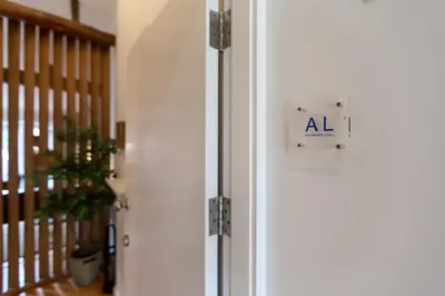 an open door with an al sign on it at OPO Vale Formoso I in Porto