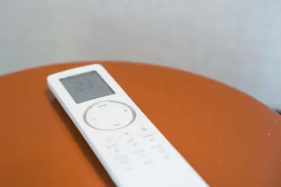 a remote control sitting on top of a table at GuestReady - Blue shades with panoramic city views in Porto