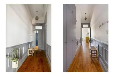 a bathroom with a large white sink and a mirror at Stylish Downtown Apartment in Porto